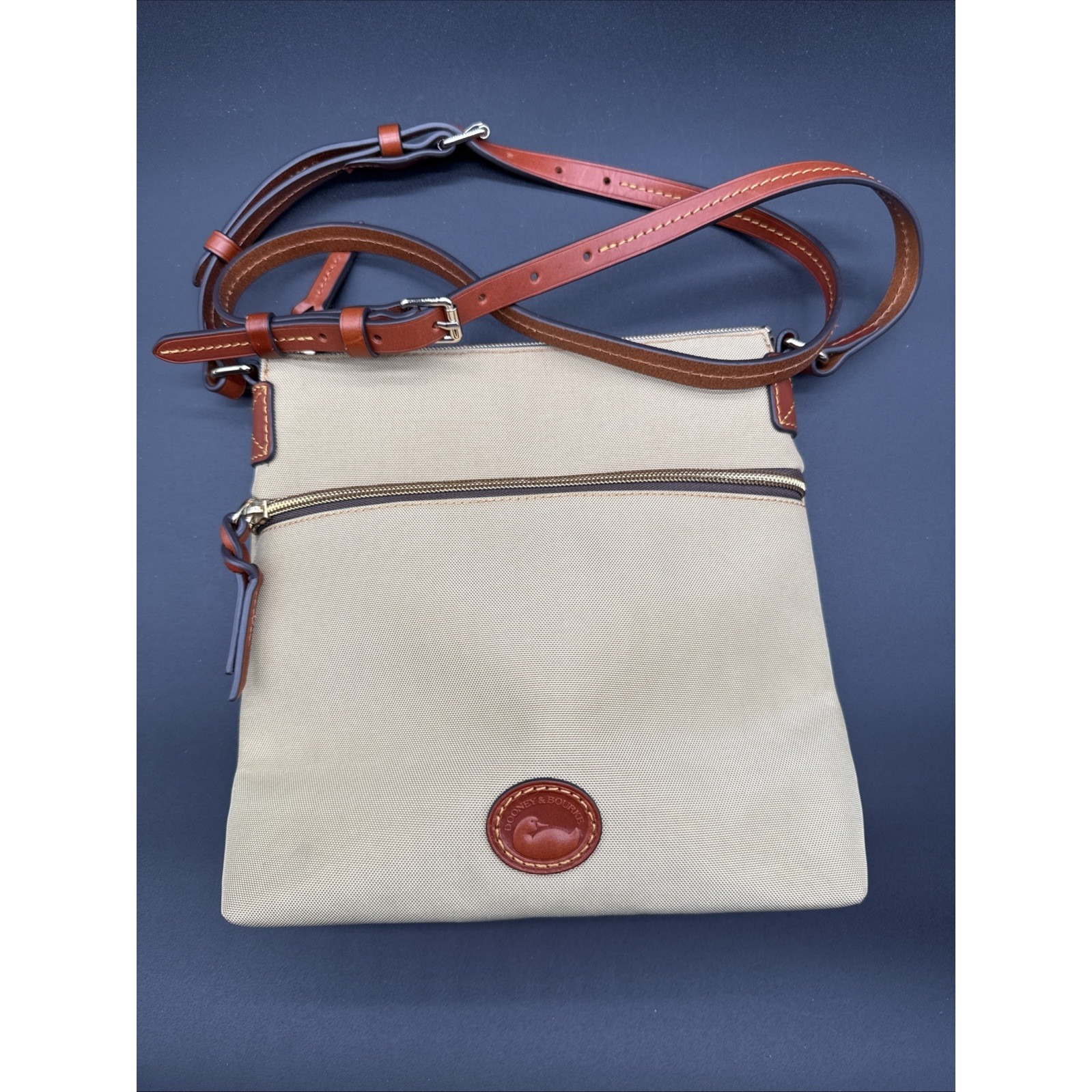 Dooney & Bourke Beige Canvas Crossbody With Brown Leather Trim And Strap